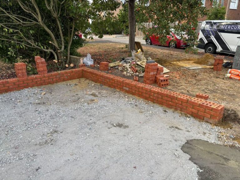 block paved driveway with brick wall in romford 14