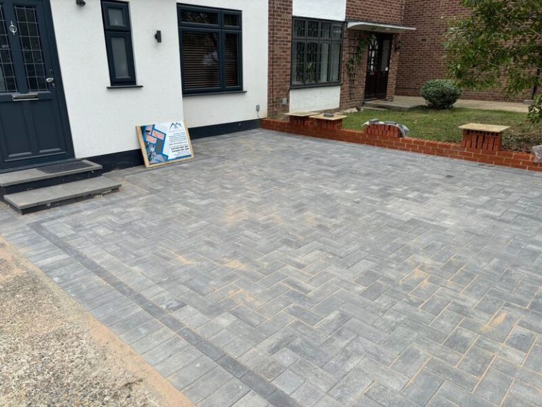 block paved driveway with brick wall in romford 25